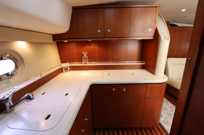 Slide: The Image of Luxurious 2008 Tiara Yachts 4300 Sovran interior with elegant wood cabinetry and modern fixtures. - 56