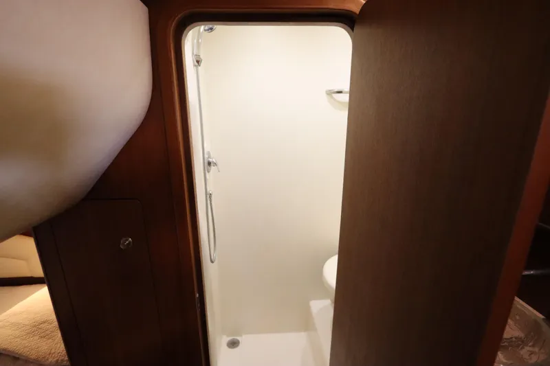 Slide: The Image of Interior shower of 2008 Tiara Yachts 4300 Sovran, featuring sleek design and wooden accents. - 65