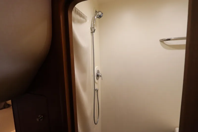 Slide: The Image of Shower area inside 2008 Tiara Yachts 4300 Sovran, featuring sleek design and modern fixtures. - 66