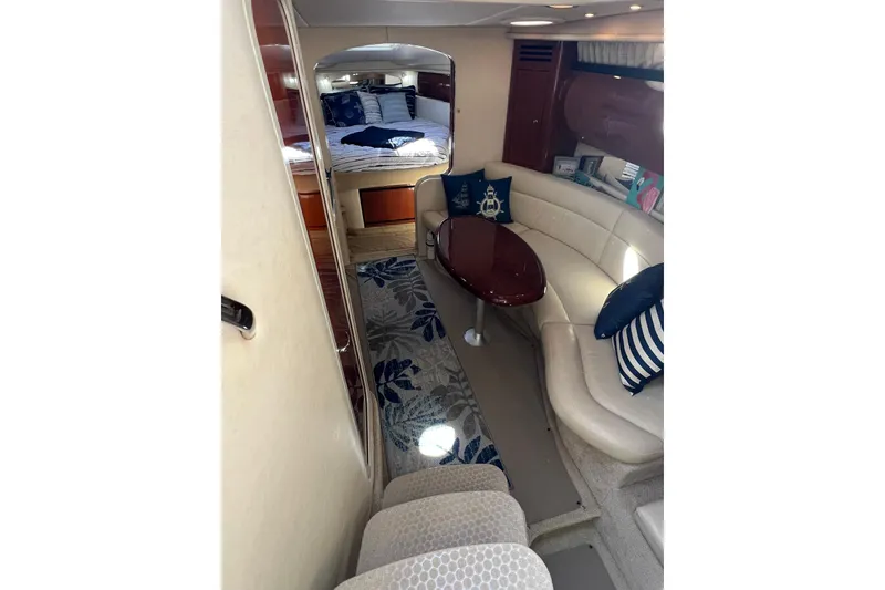 Slide: The Image of Luxurious interior of 2003 Sea Ray 360 Sundancer yacht with cozy seating and elegant decor. - 27