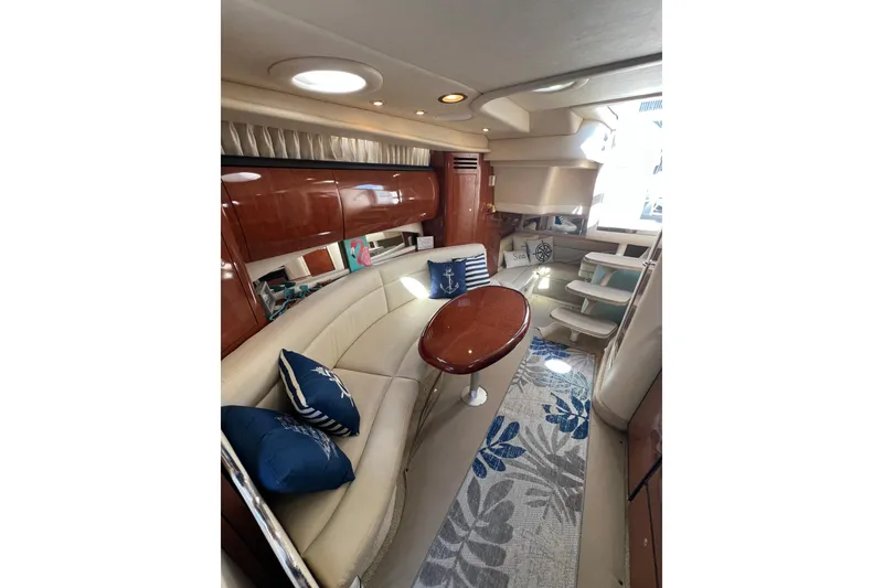 Slide: The Image of Luxurious interior of 2003 Sea Ray 360 Sundancer yacht with elegant seating and nautical decor. - 29