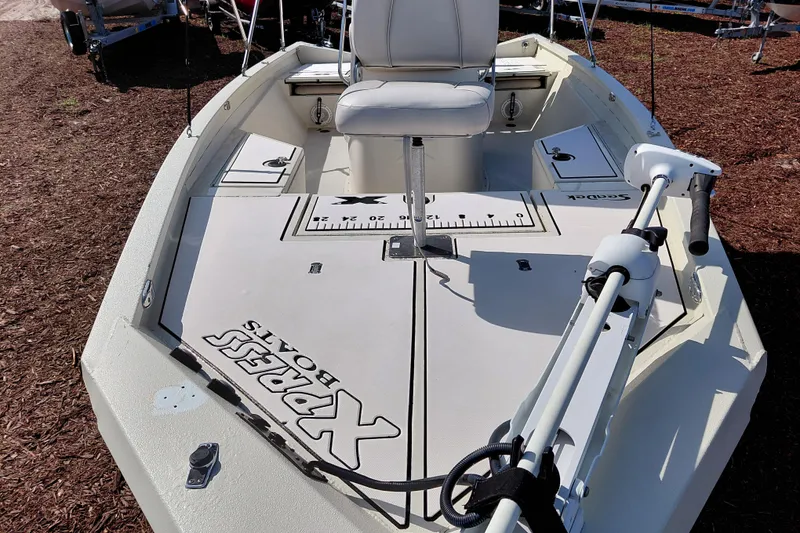Slide: The Image of 2016 Express 20 BAY boat deck with seating and fishing equipment. - 11