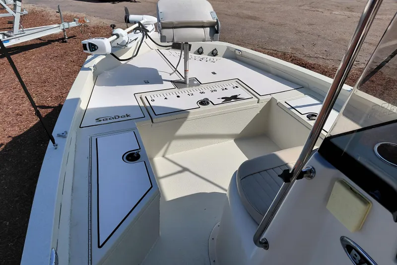 Slide: The Image of 2016 Express 20 BAY boat deck with SeaDek flooring and fishing ruler. - 36