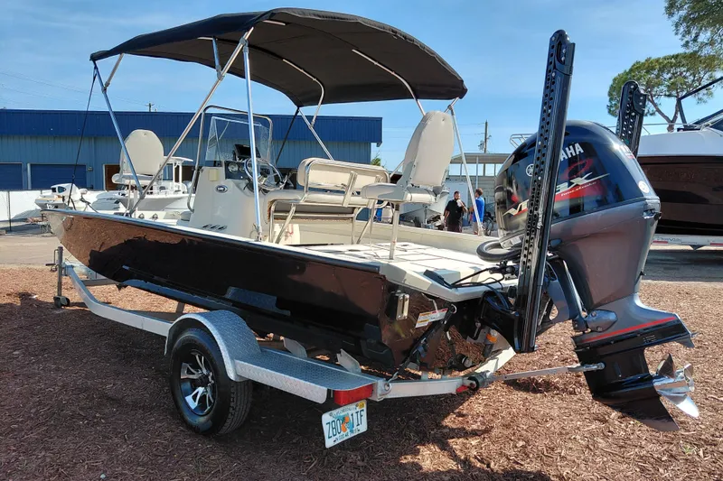 Slide: The Image of 2016 Express 20 BAY boat with Yamaha outboard motor on trailer. - 6
