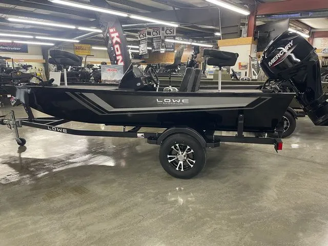 The Image of Lowe Skorpion 16 boat 2026 in showroom with Mercury engine. - 1