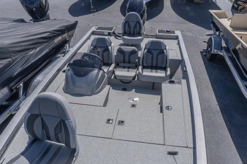 Slide: The Image of 2026 G3 Sportsman 1810 boat with sleek seating and modern design. - 16