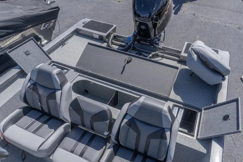 Slide: The Image of 2026 G3 Sportsman 1810 boat interior with seating and storage compartments. - 18