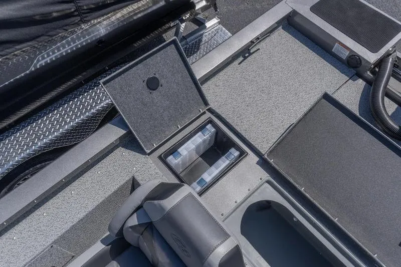 Slide: The Image of 2026 G3 Sportsman 1810 boat interior with storage compartments and seating. - 20