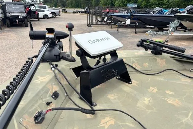 Slide: The Image of 2017 Tracker Grizzly 1654 MVX Sportsman with Garmin GPS on deck. - 9