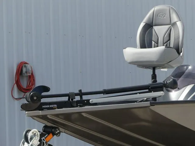 Slide: The Image of 2026 G3 Sportsman 1710 boat with Minn Kota motor. - 11