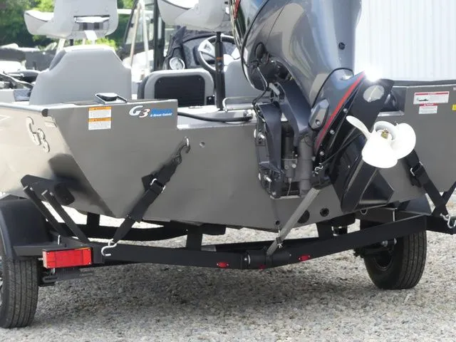 Slide: The Image of 2026 G3 Sportsman 1710 boat with outboard motor on trailer. - 16
