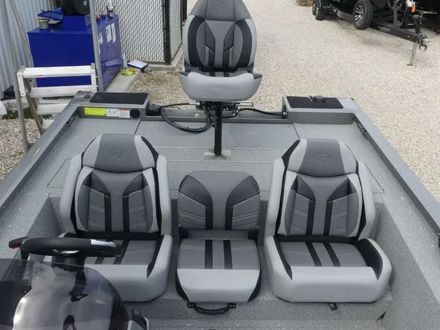 Slide: The Image of Interior of 2026 G3 Sportsman 1710 boat with gray seating. - 25