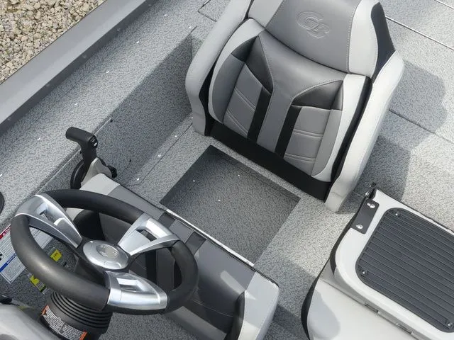 Slide: The Image of Interior of G3 Sportsman 1710 boat, 2026 model, featuring steering wheel and seat. - 28