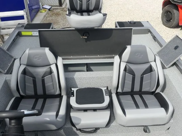 Slide: The Image of Interior of G3 Sportsman 1710 boat, gray and black seats, model year 2026. - 29