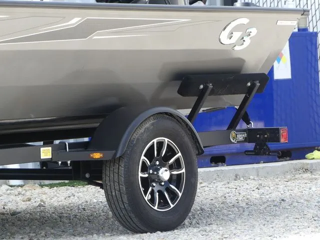 Slide: The Image of 2026 G3 Sportsman 1710 boat on trailer, close-up view. - 8