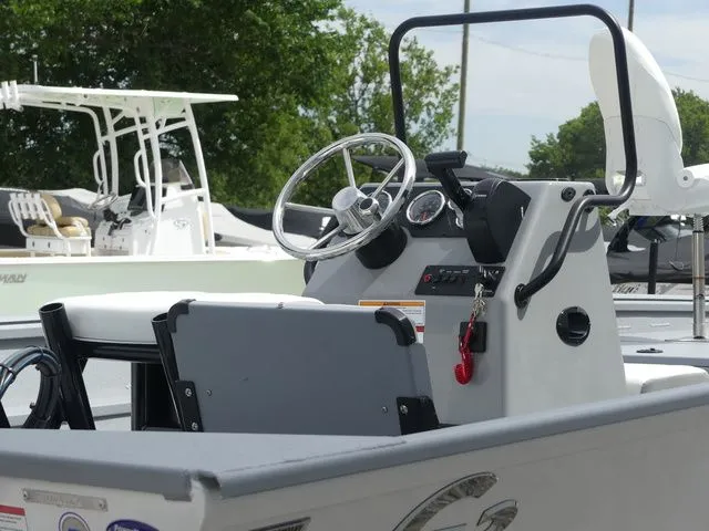 Slide: The Image of 2026 G3 Bay 20 boat console with steering wheel and gauges. - 12