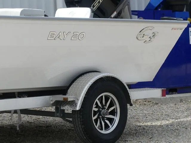 Slide: The Image of 2026 G3 Bay 20 boat on trailer, side view. - 14