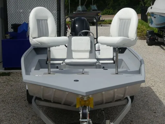 Slide: The Image of 2026 G3 Bay 20 boat with white seats on trailer. - 15