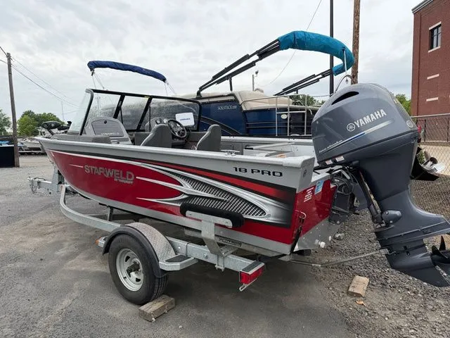 Slide: The Image of 2016 Starweld 18 Pro boat with 115 HP Yamaha engine. - 2