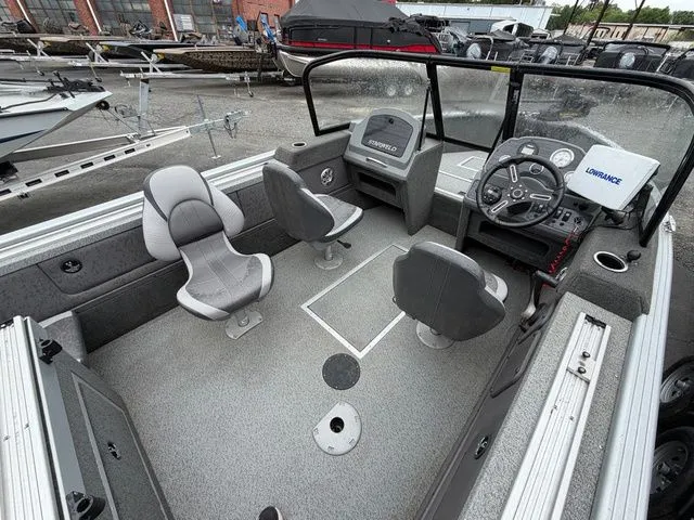 Slide: The Image of Interior of a 2016 Starweld 18 Pro boat with 115 HP Yamaha engine. - 5