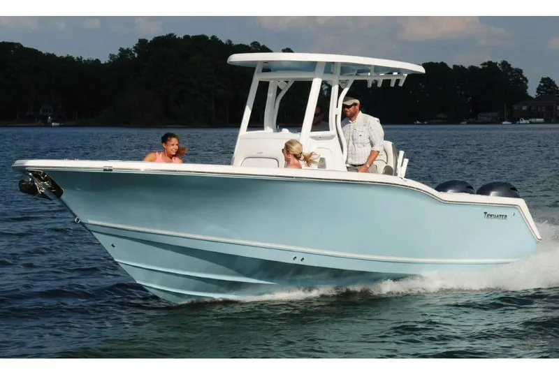 The Image of 2017 Tidewater 252 CC Adventure boat on trailer, parked outdoors. - 0
