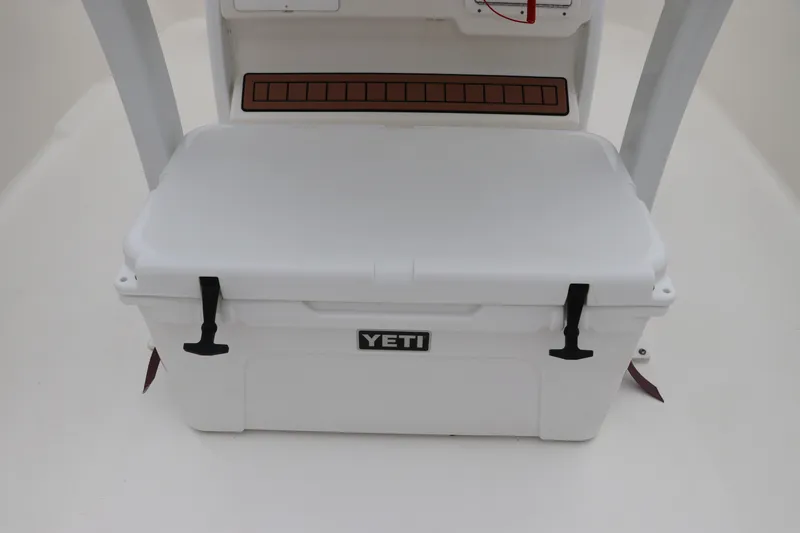 Slide: The Image of YETI cooler on 2017 Tidewater 252 CC Adventure boat deck. - 18