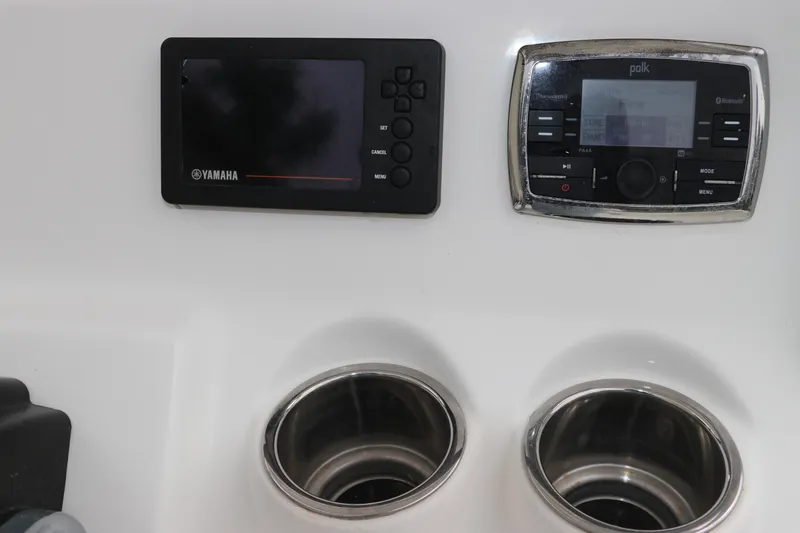 Slide: The Image of Control panel of 2017 Tidewater 252 CC Adventure boat with Yamaha and Polk displays. - 29