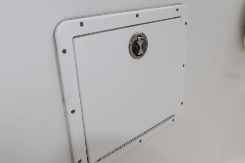 Slide: The Image of Hatch door on 2017 Tidewater 252 CC Adventure boat, featuring secure latch. - 32