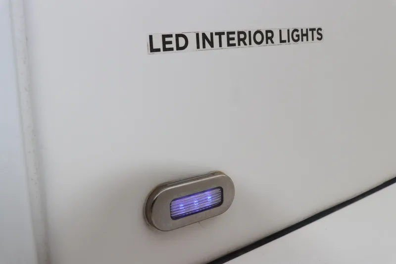 Slide: The Image of LED interior light on 2017 Tidewater 252 CC Adventure boat. - 38