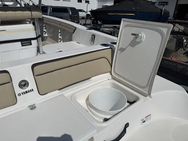 Slide: The Image of Yamaha 195S 2021 boat with open storage compartment and seating area. - 10