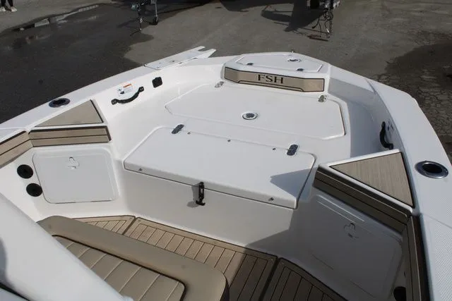 Slide: The Image of Yamaha 195S 2021 boat, front deck view with storage. - 6