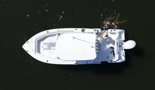 Slide: The Image of Aerial view of a 2026 Sea Hunt Ultra 255 SE boat on water. - 3