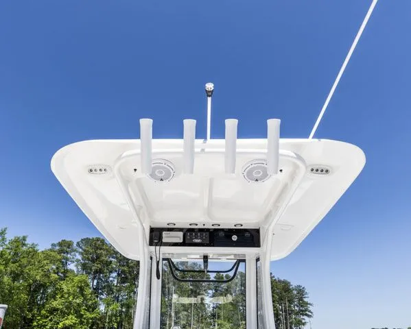 Slide: The Image of Sea Hunt Ultra 255 SE 2026 boat roof against blue sky. - 7