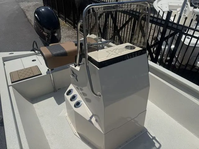 Slide: The Image of 2026 Xpress Boats H190B with console and outboard motor. - 14