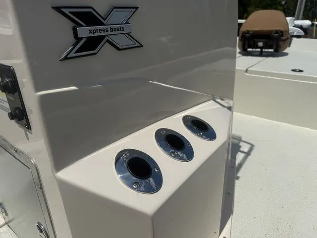 Slide: The Image of Close-up of Xpress Boats H190B 2026 with cup holders. - 16
