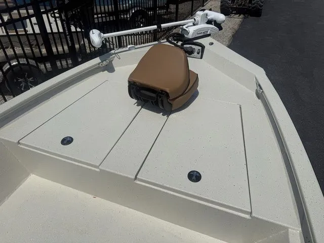 Slide: The Image of 2026 Xpress Boats H190B with seat and storage compartments. - 7