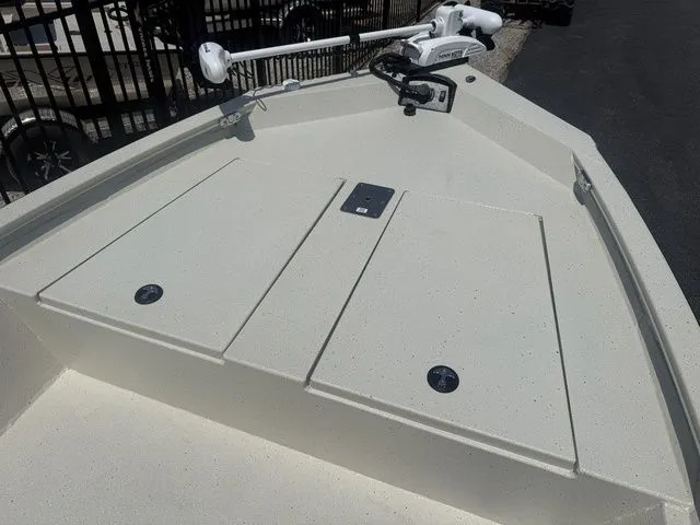 Slide: The Image of Bow view of 2026 Xpress Boats H190B with storage compartments. - 8