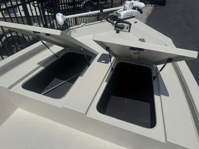 Slide: The Image of Xpress Boats H190B 2026 with open storage compartments on deck. - 9