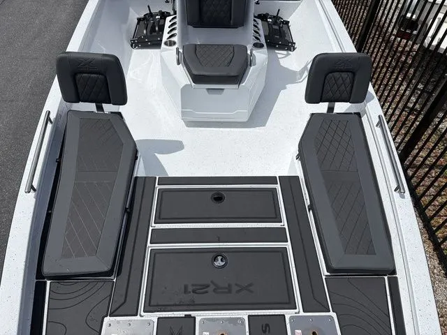 Slide: The Image of Interior view of 2026 Xpress Boats XR21B with black seating. - 11
