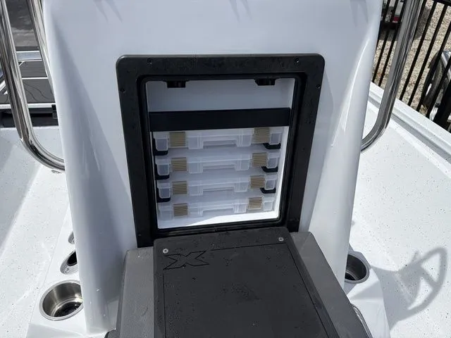 Slide: The Image of Xpress Boats XR21B 2026 featuring built-in storage and cup holders. - 18