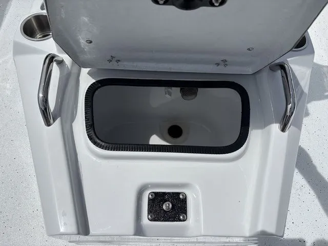 Slide: The Image of Open storage compartment on Xpress Boats XR21B 2026 model. - 19