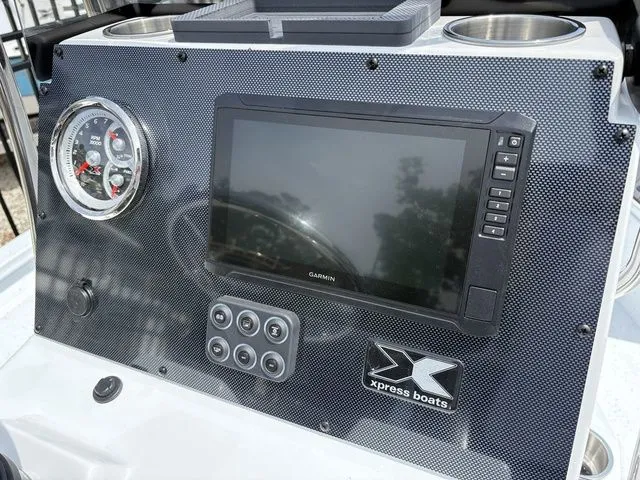 Slide: The Image of Dashboard of Xpress Boats XR21B 2026 with Garmin display. - 22