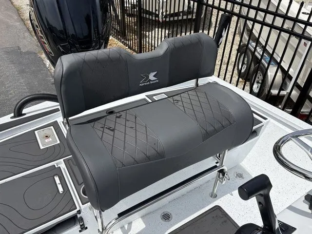 Slide: The Image of 2026 Xpress Boats XR21B seat with gray upholstery. - 24