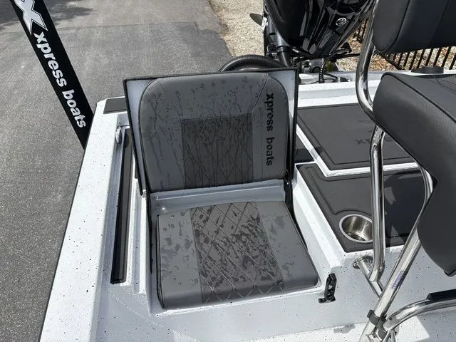 Slide: The Image of 2026 Xpress Boats XR21B seating area with modern design. - 25