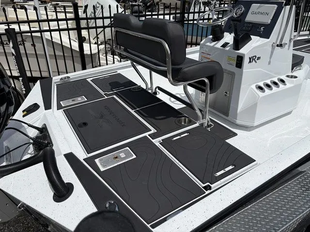 Slide: The Image of 2026 Xpress Boats XR21B with Garmin controls and seating bench. - 27
