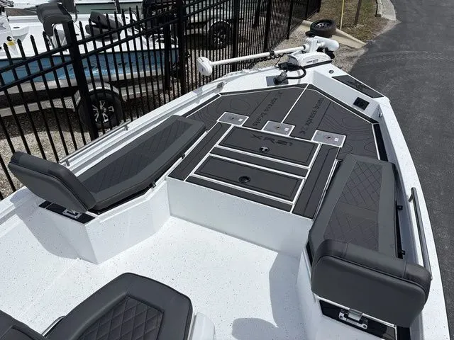 Slide: The Image of 2026 Xpress Boats XR21B with sleek deck design. - 6