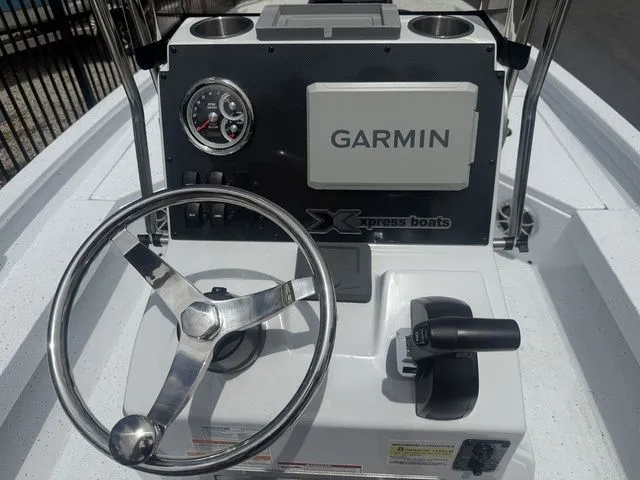 Slide: The Image of 2026 Xpress Boats H20B console with Garmin navigation system. - 16