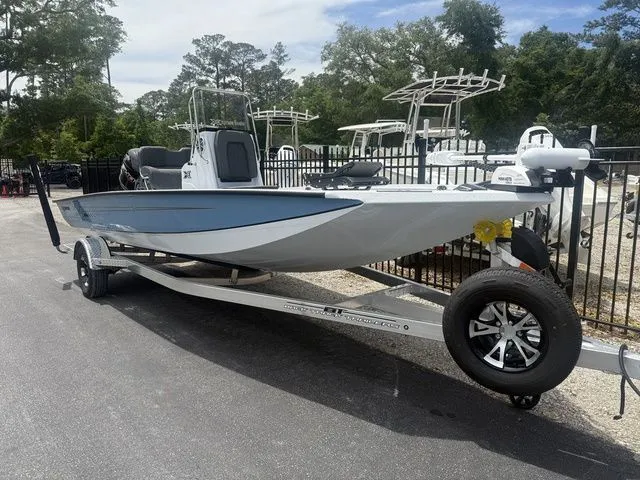Slide: The Image of 2026 Xpress Boats H20B on trailer, side view. - 3