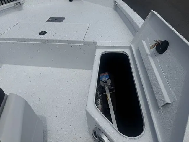 Slide: The Image of 2026 Xpress Boats H20B with open storage compartment. - 8