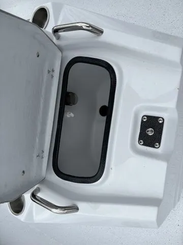 Slide: The Image of Interior view of Xpress Boats H20B 2026 storage compartment. - 10